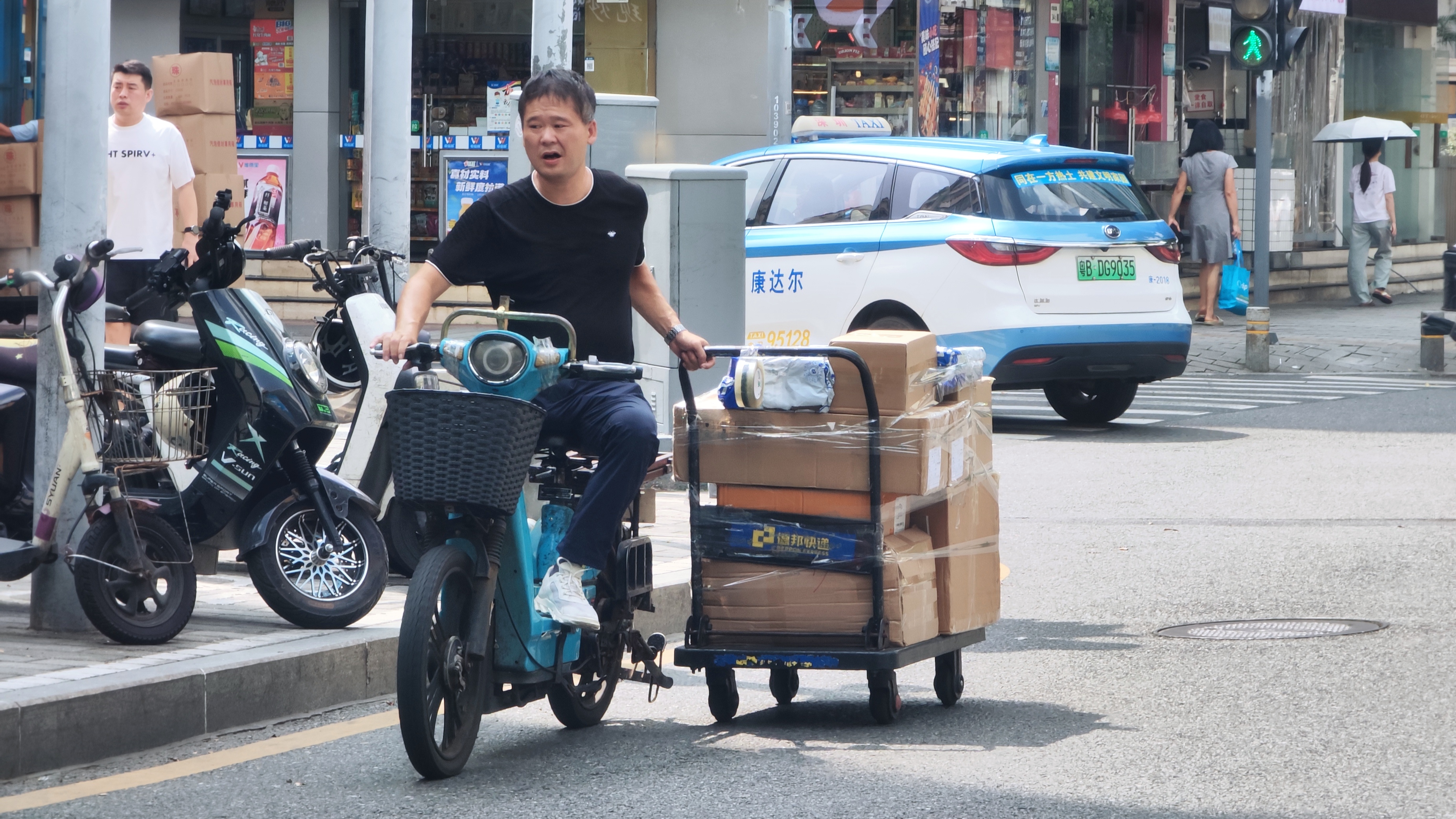 Scooter delivery in Huaqiangbei — components move fast in Shenzhen